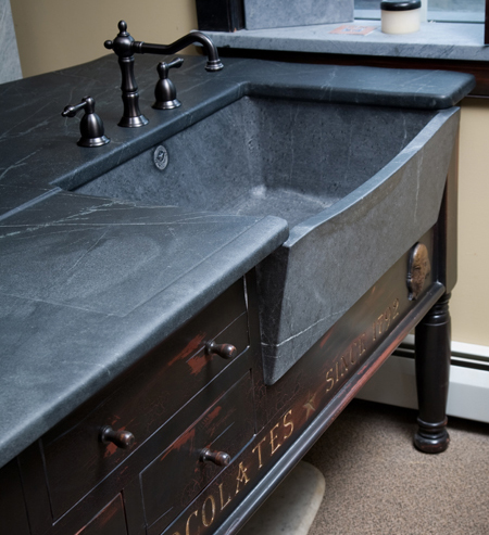 Franklin island sink with slant front and bow.